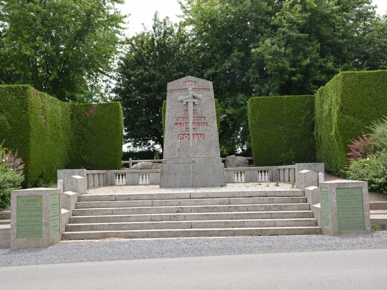 In this picture there is a stone in the center. On the stone, there is a sword and text engraved on...