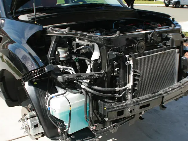 In the image there is a car with an engine is open. At the top right corner of the image there is a...