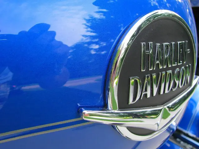 In the center of the image, we can see a vehicle and there is some text on it.